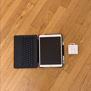 Apple Tablet with Black Keyboard and Charger